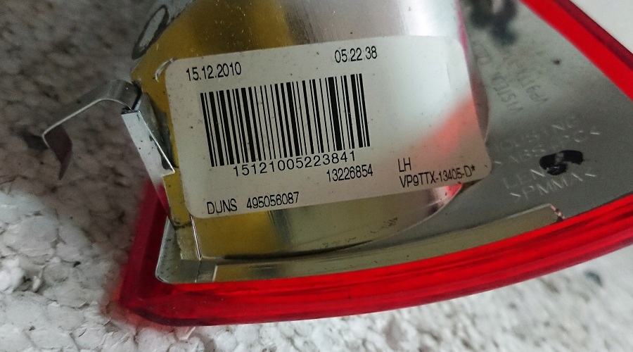 Лампа левая задняя opel 13226854 Оригинал