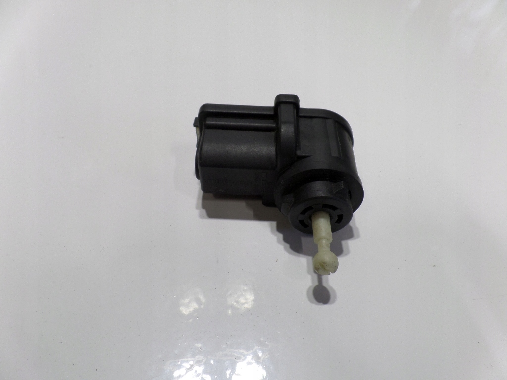 фото №1, Volkswagen lupo i моторчик регулировки лампы