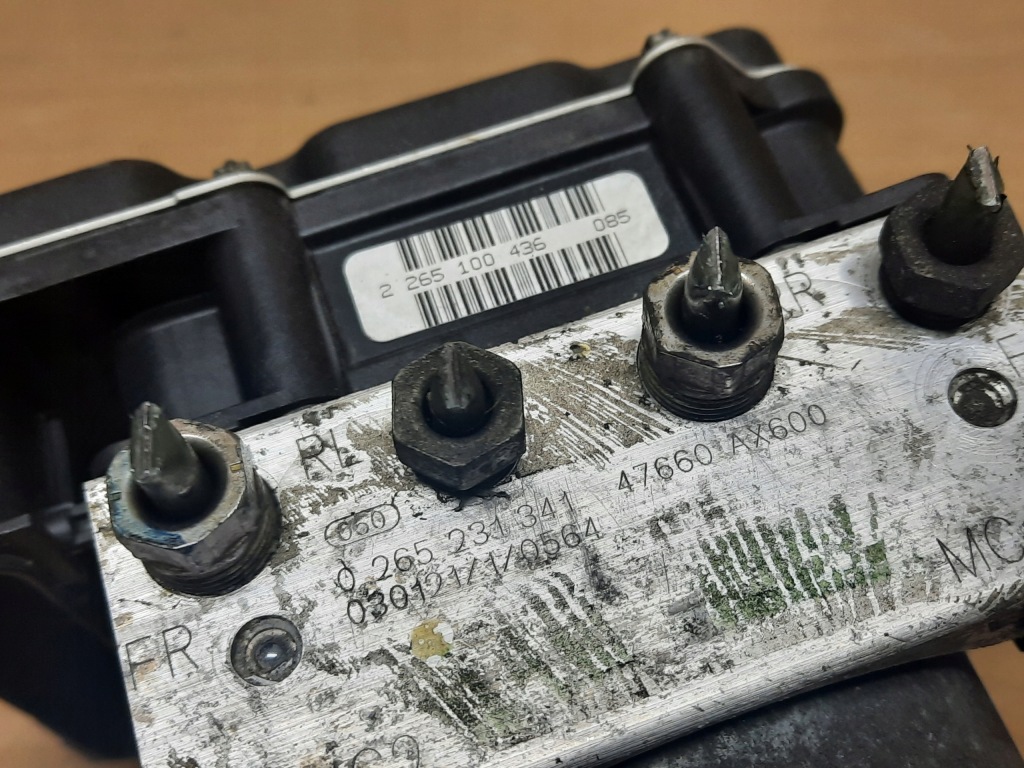 фото №4, Nissan оригинальный номер 47660ax600 насос abs