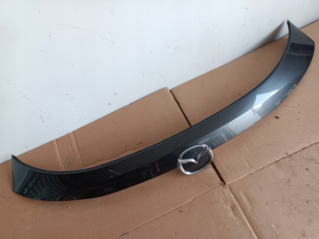 Купить Mazda оригинальный номер kb7w-50811 накладка крышки багажника