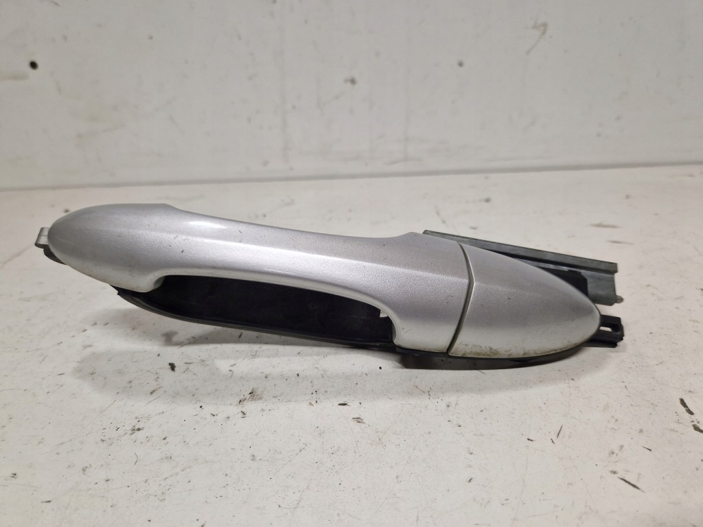 фото №1, Ручка дверь левый задняя mazda tribute 2.0 b 16v 00-07 124km