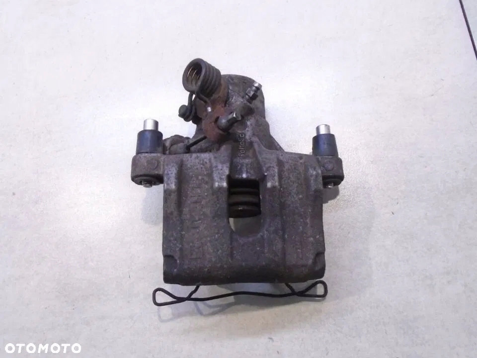 фото №1, Супорт гальмівний лівий задня mazda 3 i bk