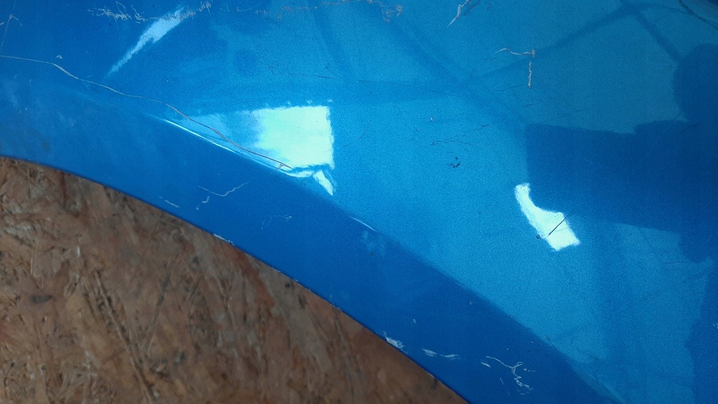 фото №10, Nissan navara d40 iii 2005- крыло левый перед оригинальный zdrowy