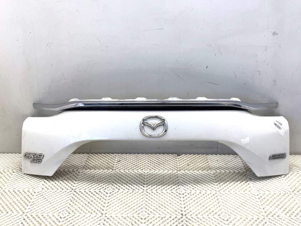 Купить Накладка крышки задний  mazda cx-9 suv tk48-50851 белый перламутр молдинг