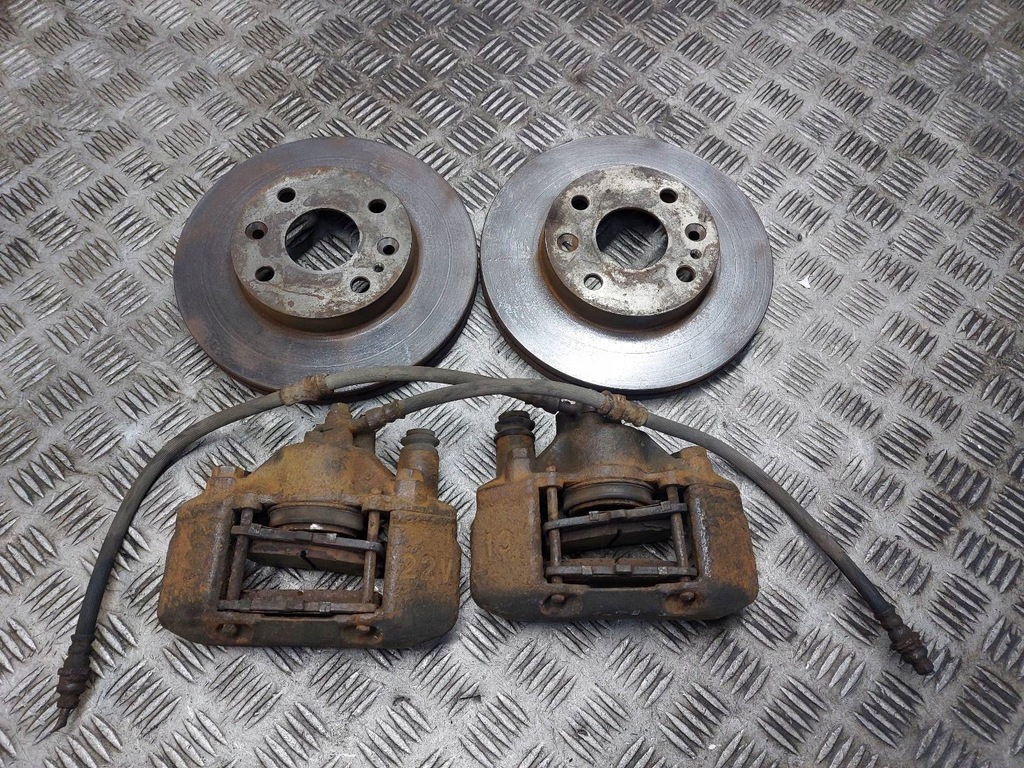 фото №1, Гальмівні диски гальмівні перед + гальмівні колодки + супорти mazda demio i lift 1.5 16v
