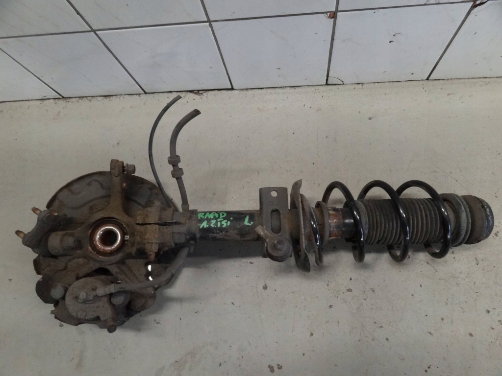 Купити Skoda rapid spaceback 2014 1.2 tsi амортизаторна стійка поворотний кулак диск супорт ліва