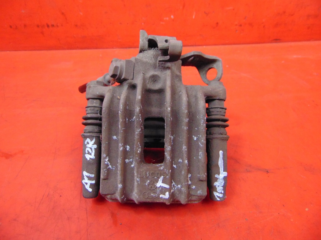 фото №1, Audi a1 8x суппорт тормозной скоба левый задняя