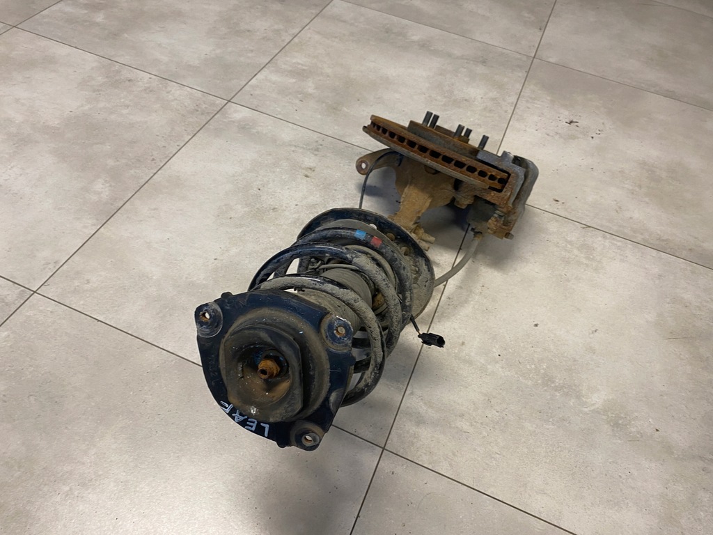 фото №5, Nissan leaf i поворотный кулак амортизационная стойка левый перед