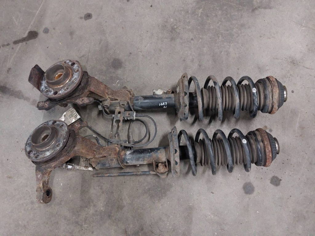 Купить Амортизатор пружина поворотный кулак левый + правый перед astra h 1.3 cdti