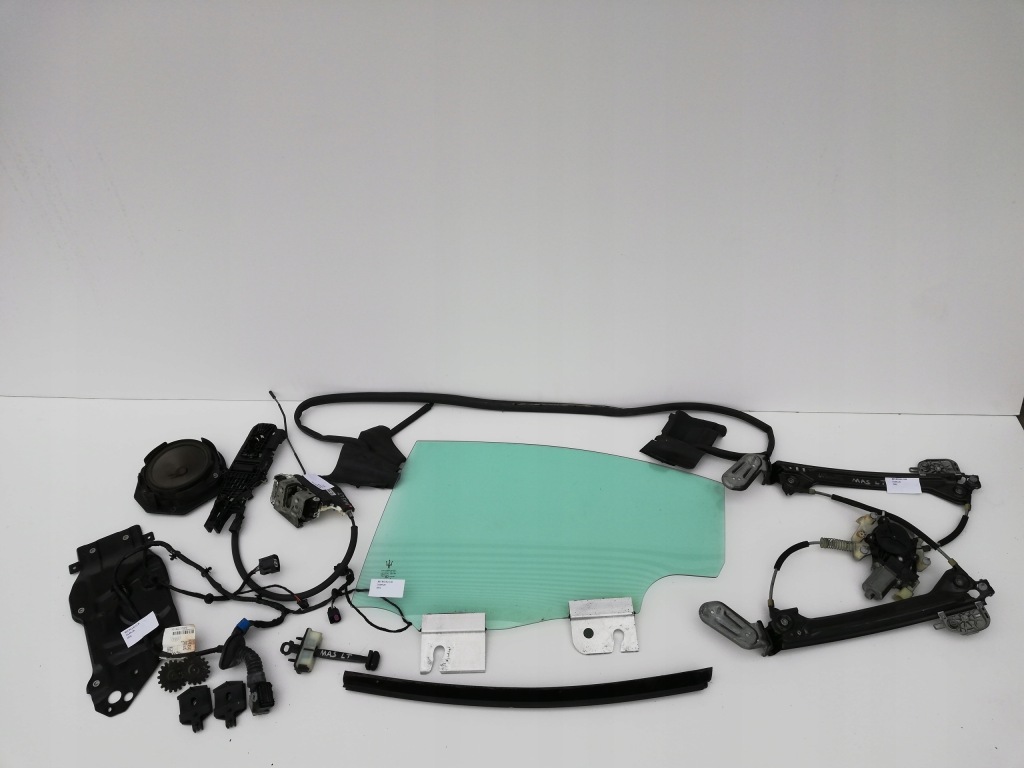 Замок двері лівий задній maserati ghibli 670030899 Оригінал