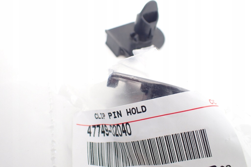 фото №7, Оригинальный номер toyota 47749-02040 клипса обивочный