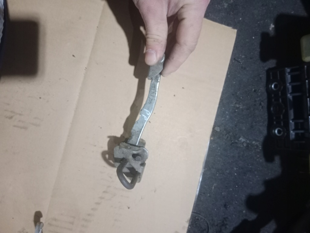 фото №1, Обмежувач двері правий перед opel meriva a