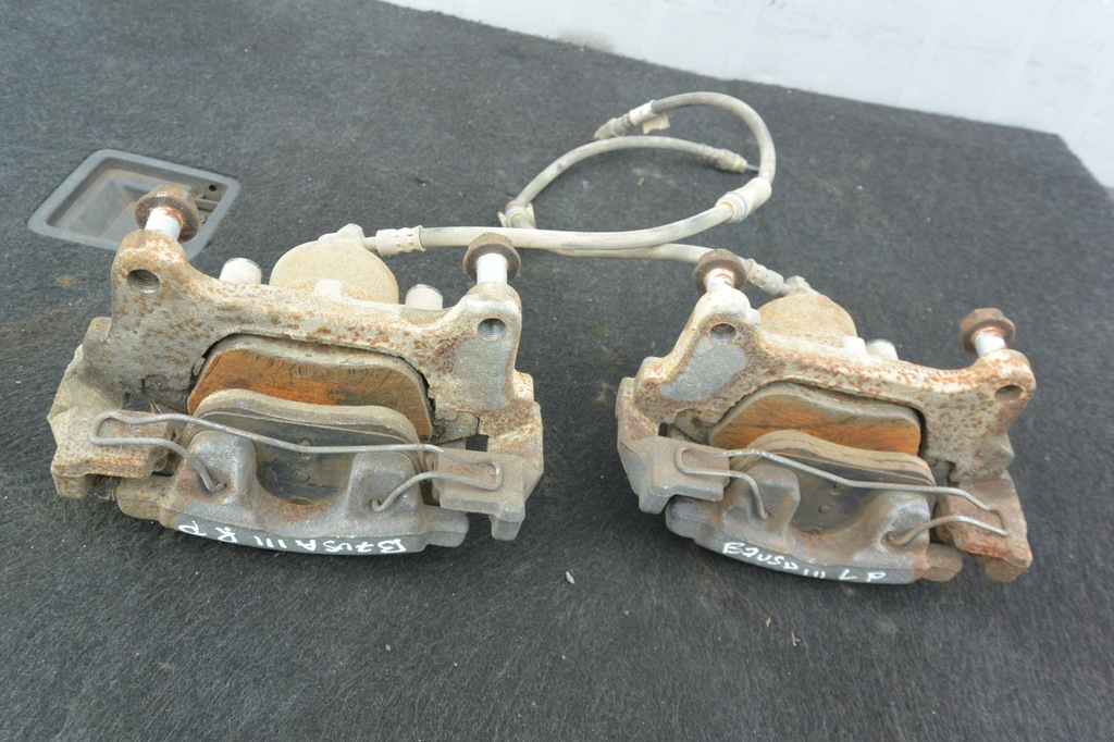 фото №8, Суппорт тормозной перед левый правый vw passat b7 usa