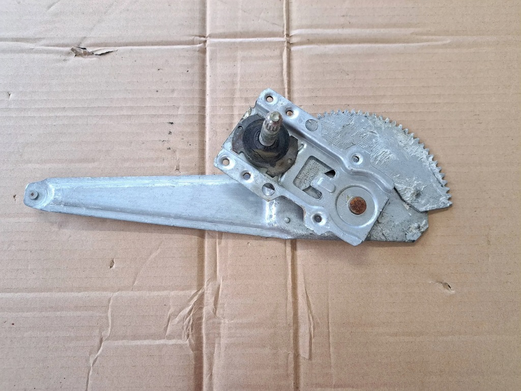 фото №1, Mazda 323f механізм скло правий задня