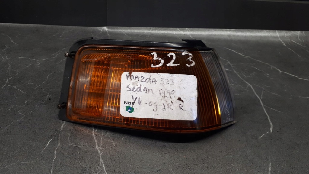 Купить 210-61301 поворотник правый mazda 323