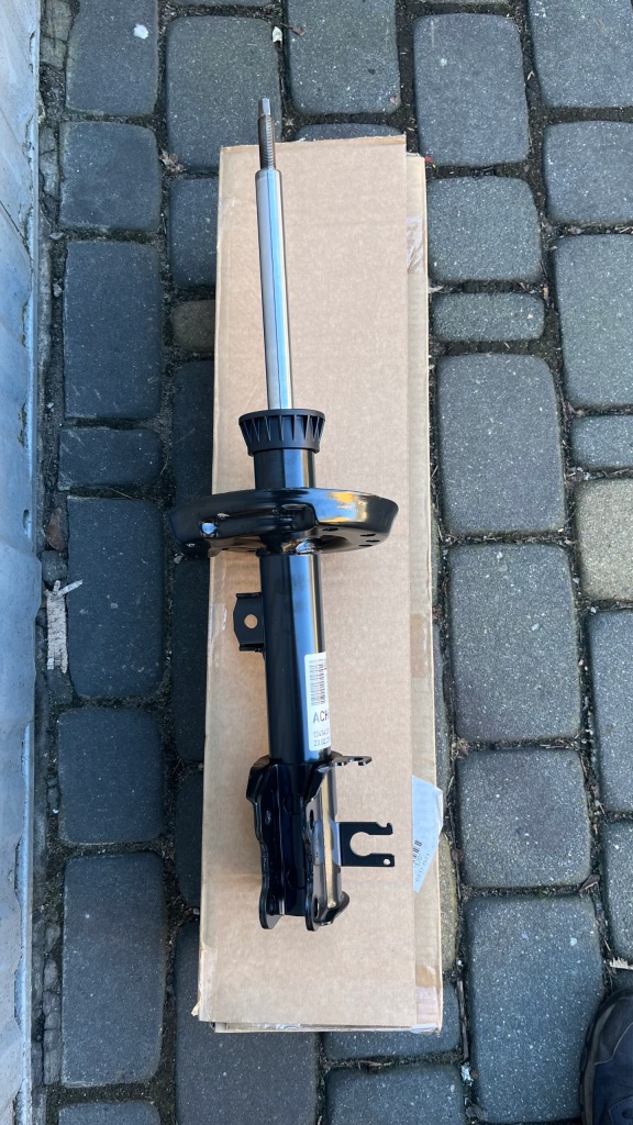 Купити Амортизатор opel adam corsa e правий новий оригінал 13434132