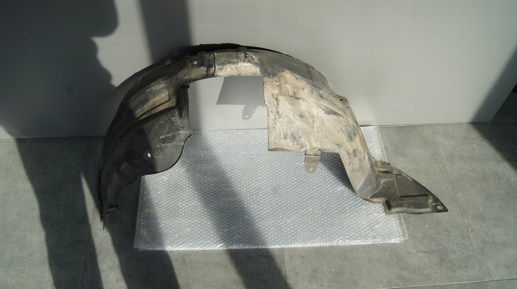 фото №1, Підкрилок mazda 2 de ліва перед 2007-2014