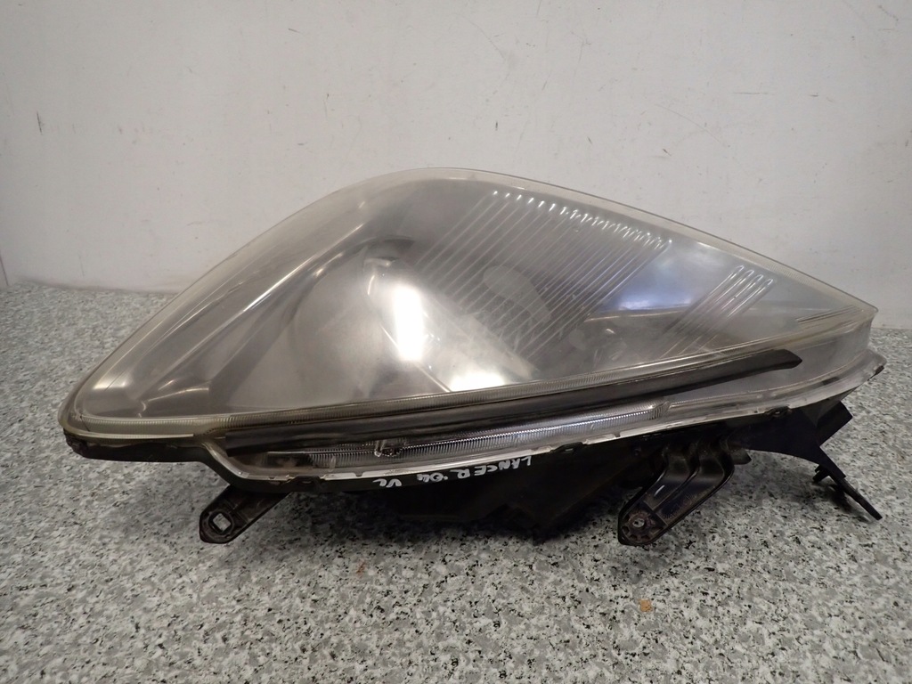 фото №6, Mitsubishi lancer vii 04- лампа передняя левая фара