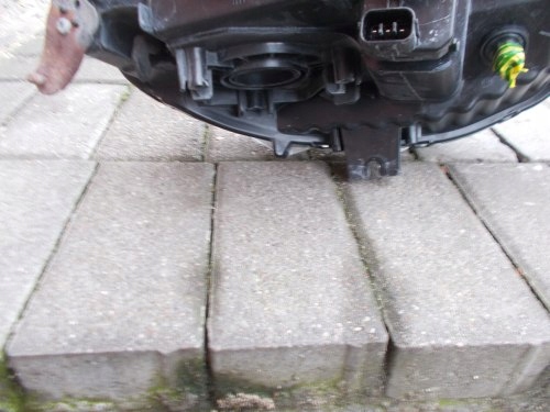 фото №10, Mitsubishi pajero sport l200 лінза h7 ліва передня лампа оригінал