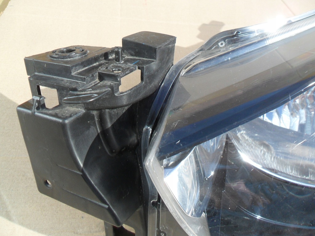 фото №13, Mazda 2 лампа левая обычная