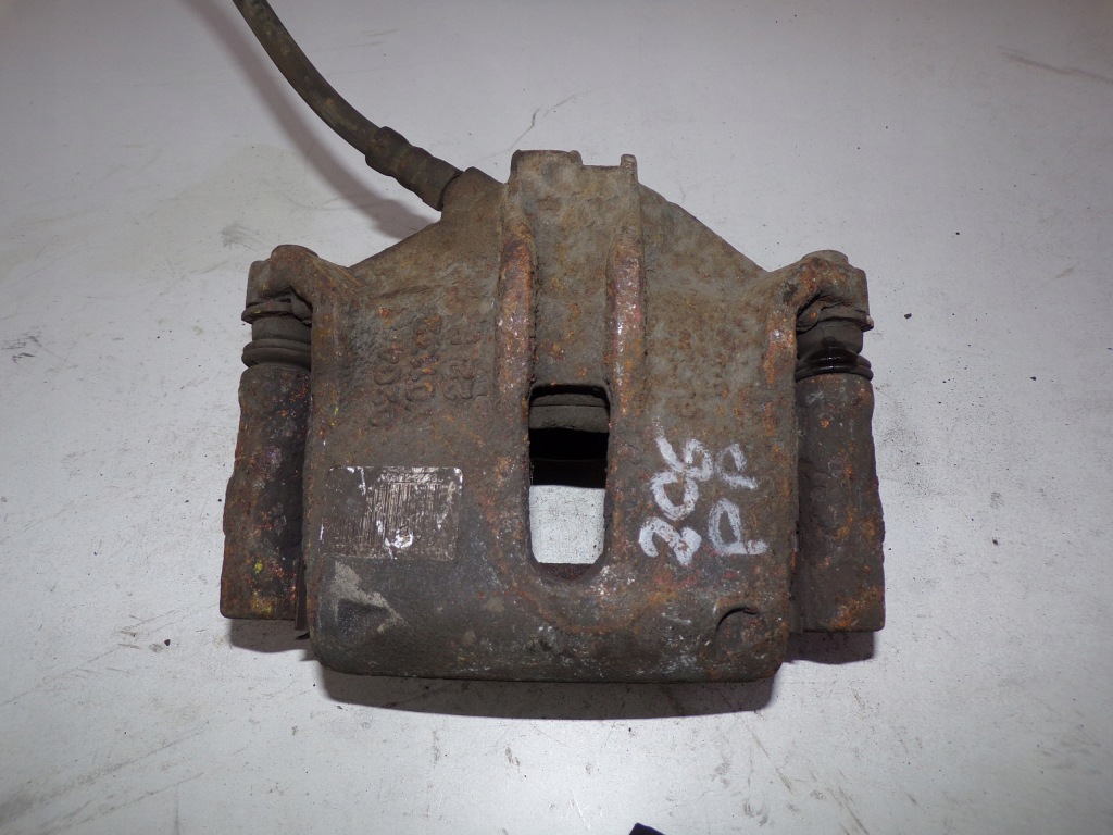 фото №1, Суппорт тормозной правый перед peugeot 206