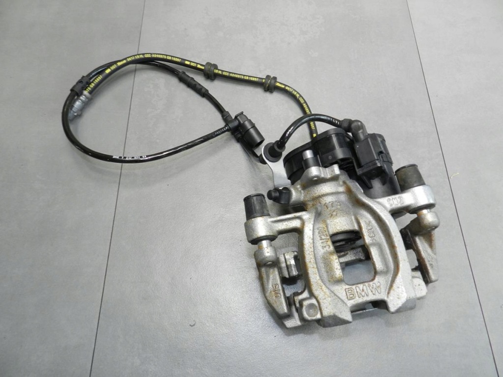 Купити Bmw x1 f48 супорт лівий задній 6880379