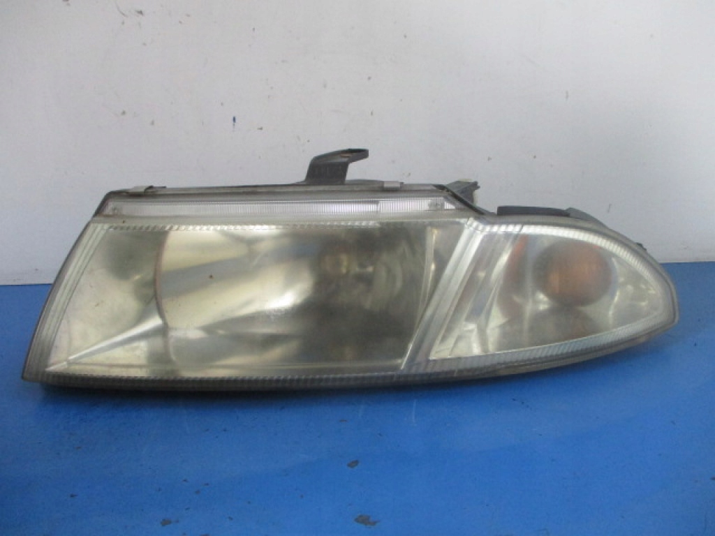 фото №1, Mitsubishi carisma lift лампа фара левый перед hella
