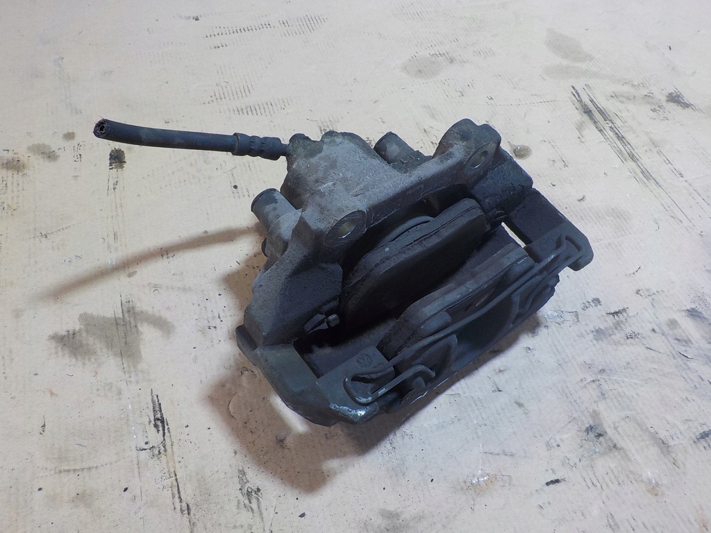 фото №4, Fabia iii супорт гальмівний лівий перед