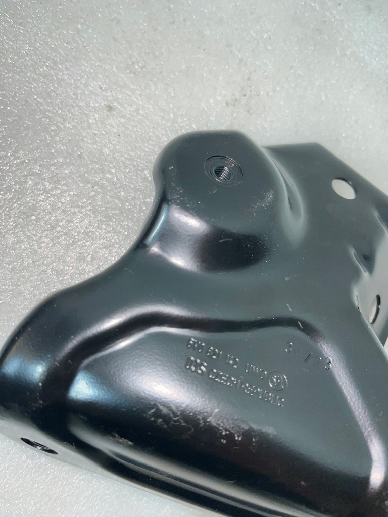 фото №11, Skoda оригінальний номер 6v0821142 кронштейн крила передній p