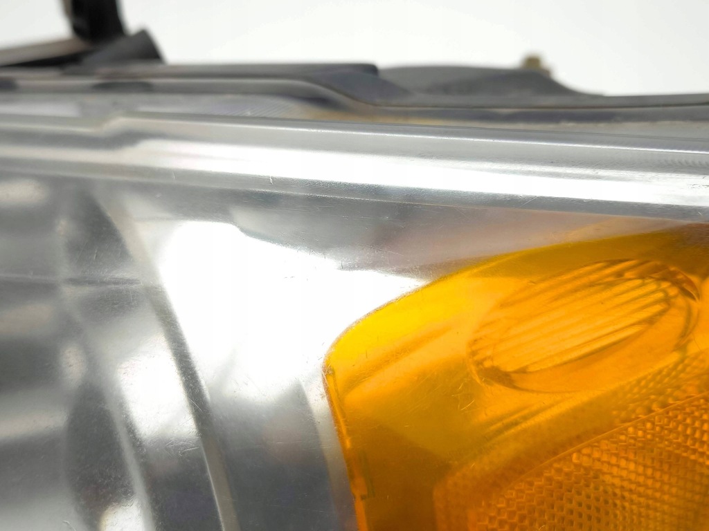 фото №15, Chrysler grand voyager v 2009 ліва сторона лампа передня