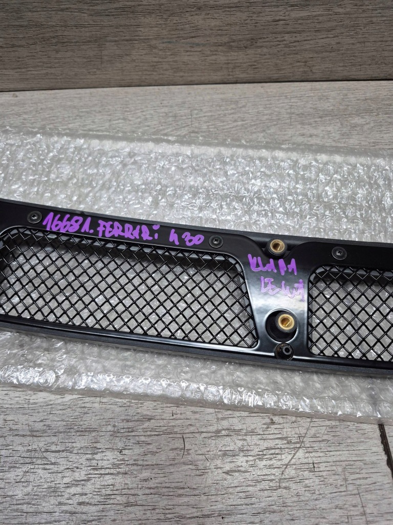 16681. ferrari 430 решётка крышка багажника левая 68075100 Недорого