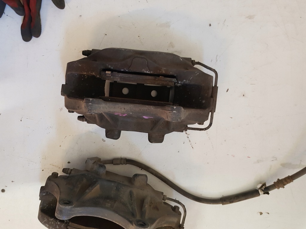 Tesla x s рестайлинг  суппорт тормозной перед левый правый с Разборки