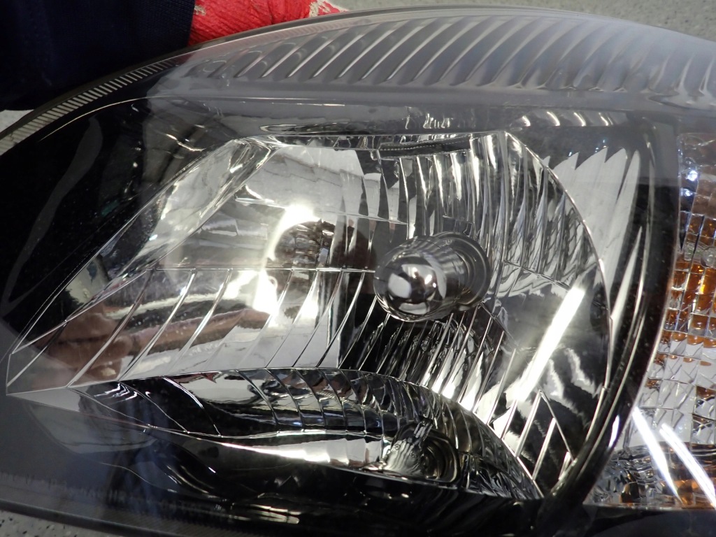 Kia rio ii 10-12 фара лівий лампа передня ліва Оригінал