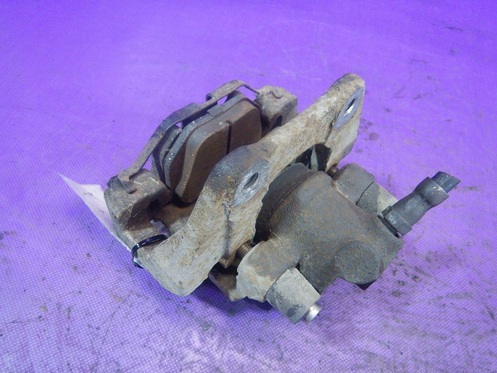 фото №4, Bmw x3 e83 2,0d супорт гальмівний задня лівий скоба