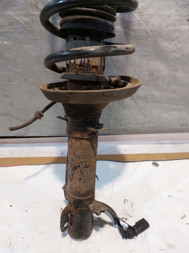 фото №8, Амортизатор пружина лівий перед vw bora 1.9tdi