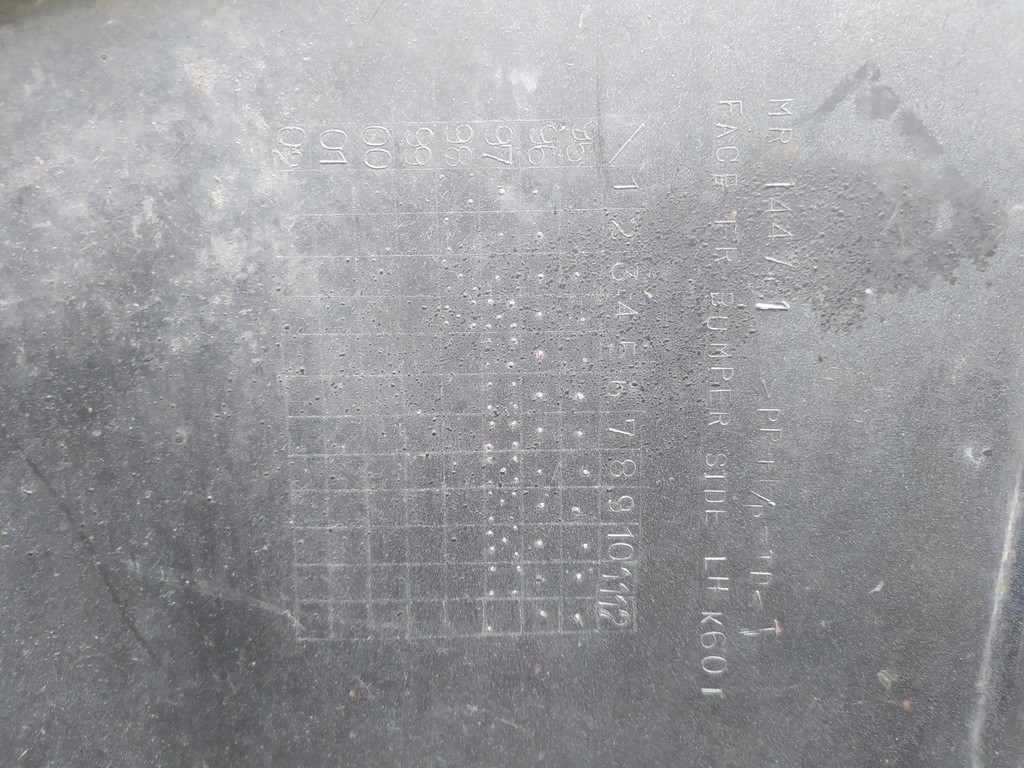 фото №5, L200 98-04 бампер передній кронштейн лівий бампера