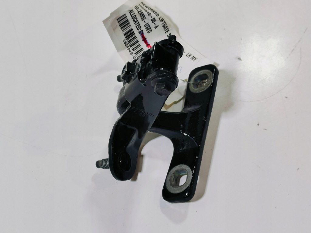 Петля кришки задній багажника лівий tesla model y Недорого