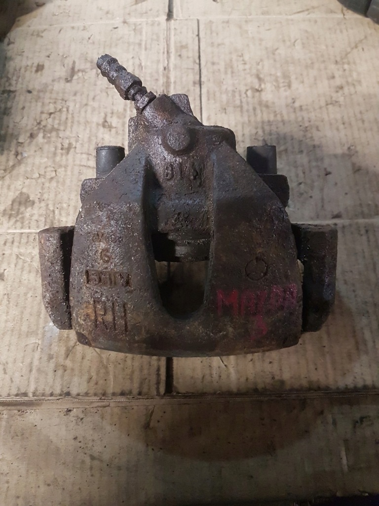 фото №1, Суппорт тормозной правый задняя mazda 3 i bk