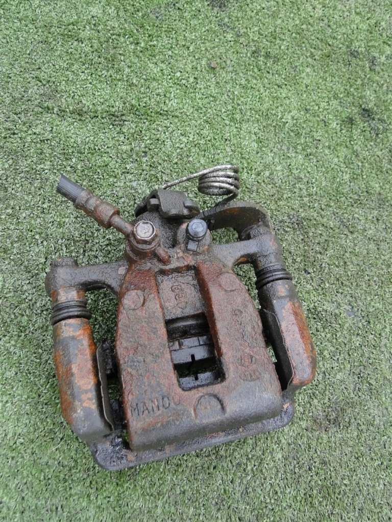 фото №1, Kia rio iii 3 суппорт тормозной + скоба правый задняя