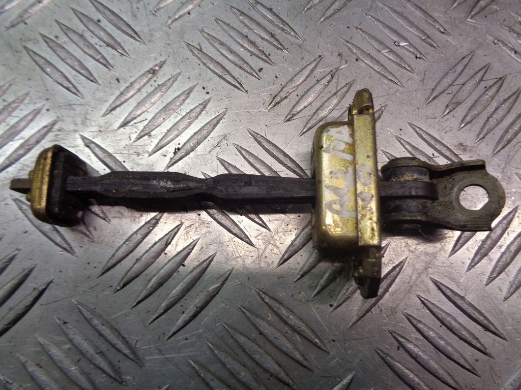 фото №1, Обмежувач двері перед nissan primera p12