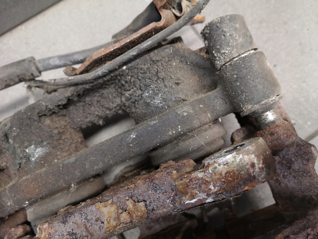 фото №7, Суппорт тормозной левый перед audi a8 d2 4.2 lift