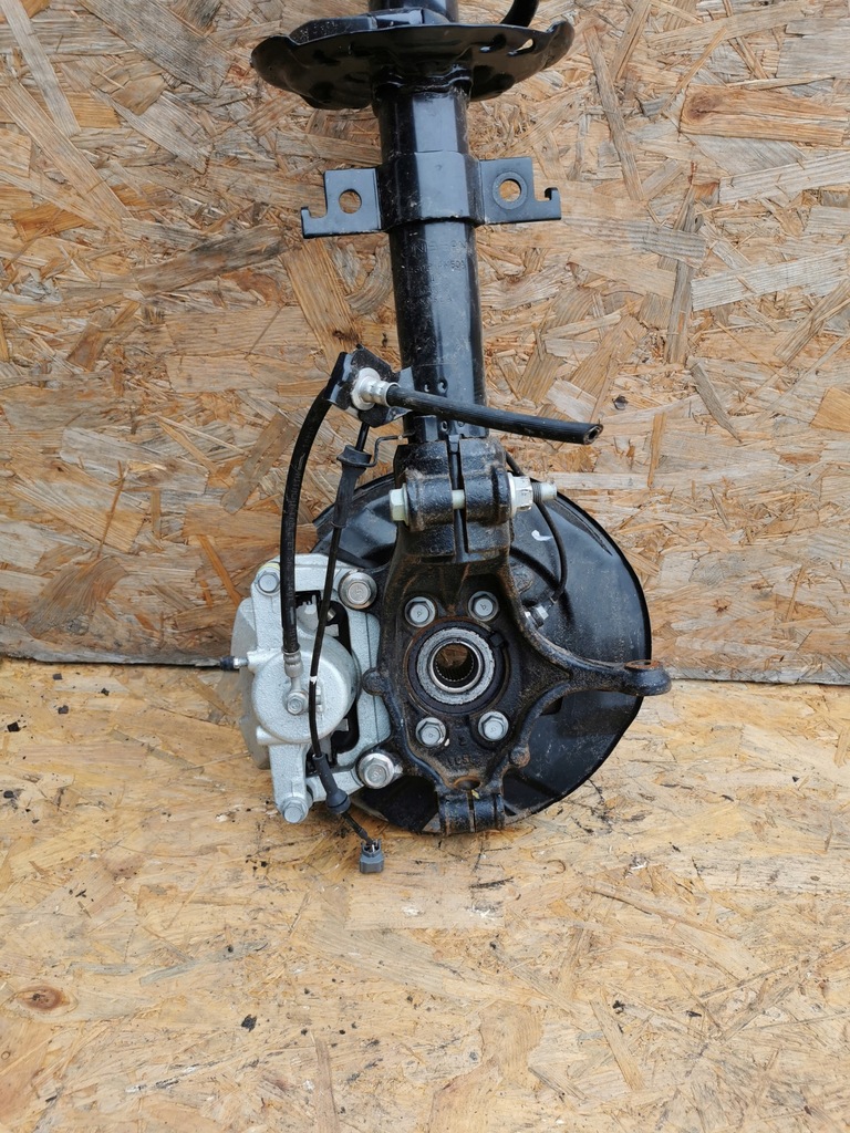 фото №1, X-trail mcperson поворотный кулак амортизатор правый перед