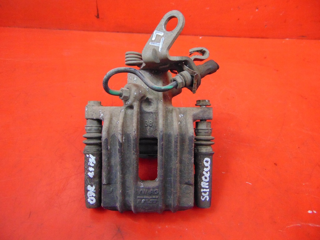 фото №1, Vw scirocco 3 iii супорт гальмівний лівий задня