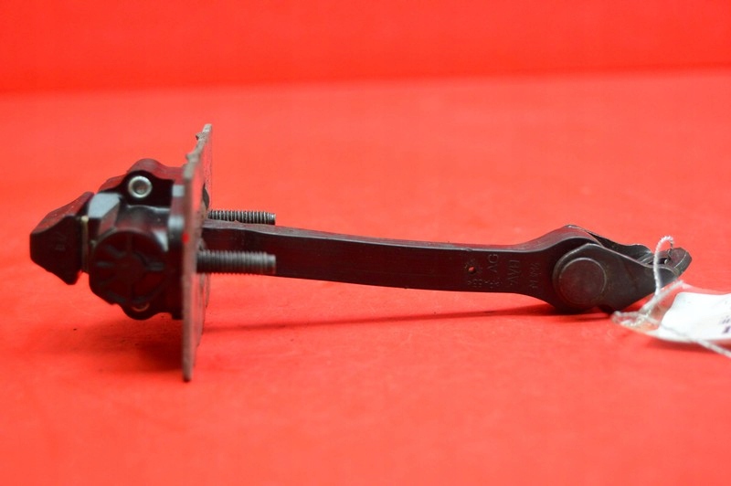 фото №4, Обмежувач двері лівий перед peugeot 301 15r