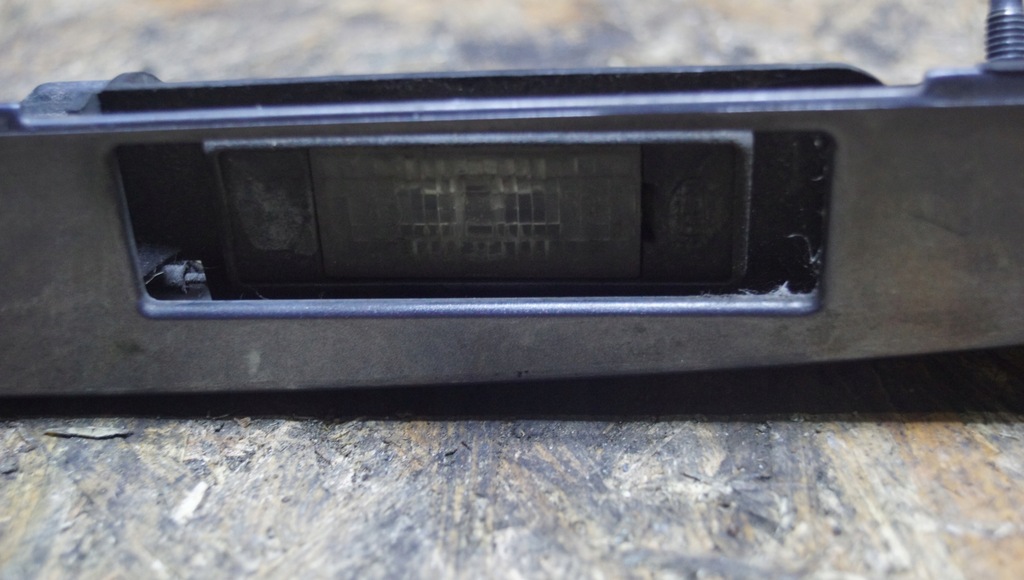 фото №9, Nissan note e11 накладка кришки задня мікровимикач