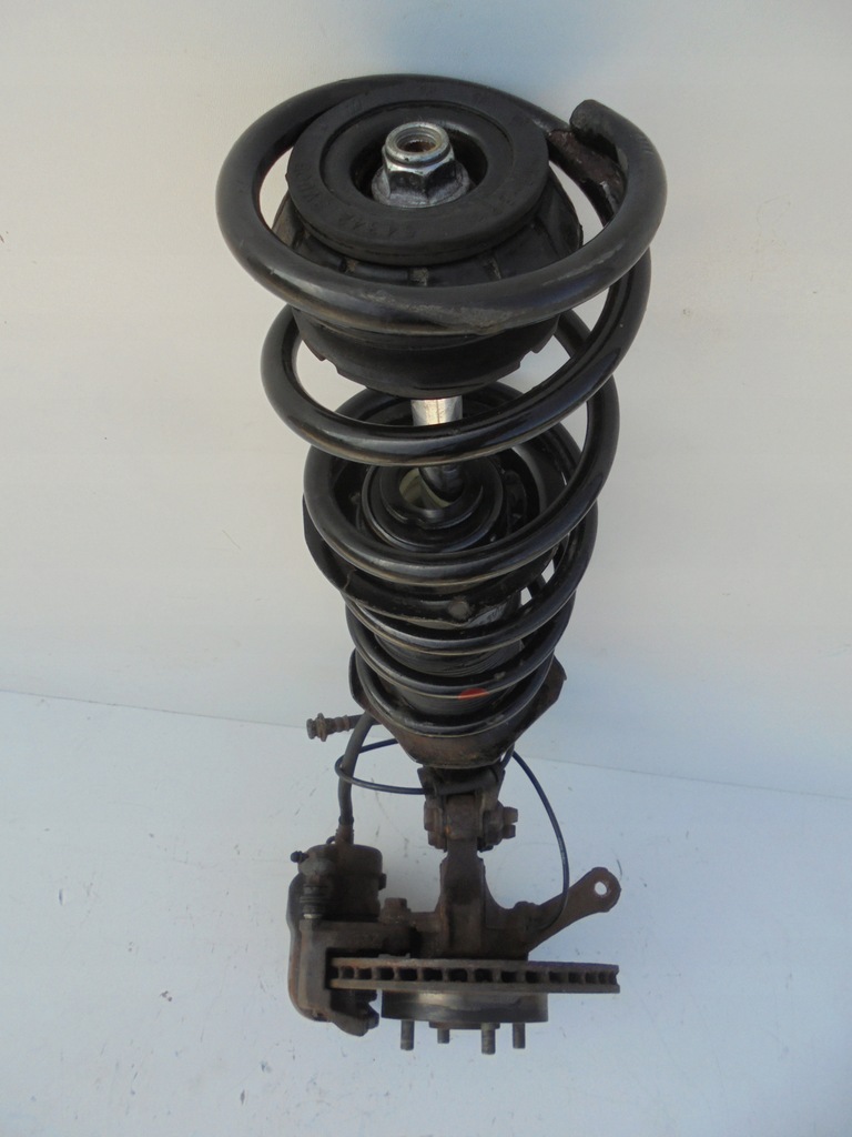 фото №6, Nissan note ii e12 амортизаторна стійка поворотний кулак ліва