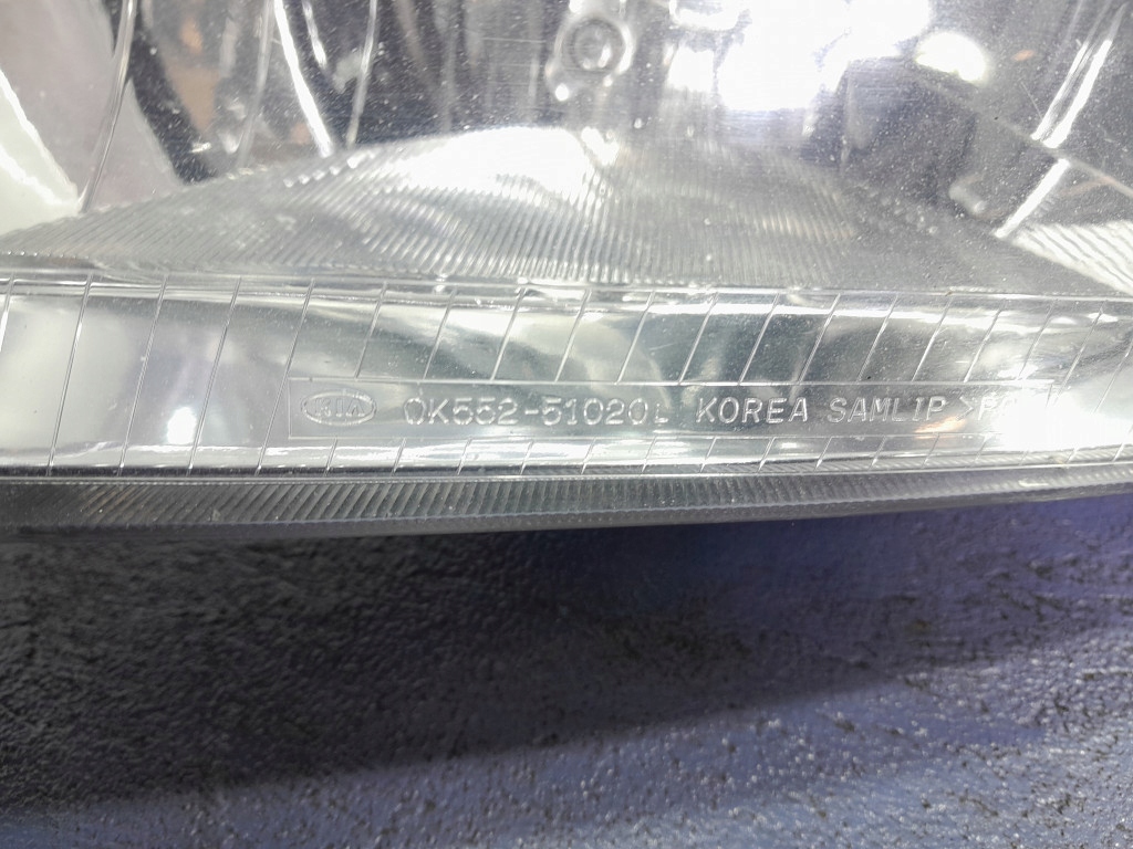 фото №8, Kia carnival i лампа фара левый eu ok552-51020l