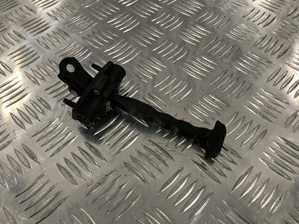 фото №1, Обмежувач двері перед opel astra v k 15-