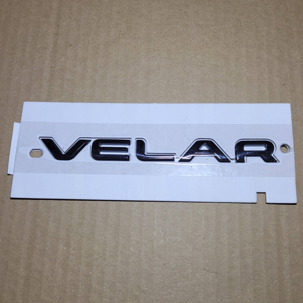фото №1, Land rover range rover velar надпись эмблема крышки новый оригинальный номер lr095758