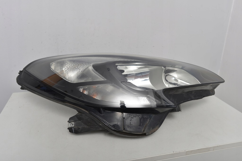Opel corsa e правая лампа перед 13381336 Оригинал